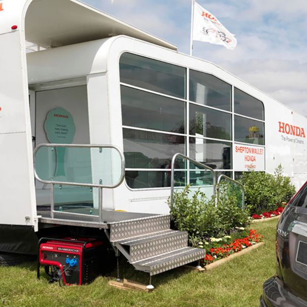 Generator de curent pe benzina Honda EM5500CXS2 portabil monofazat 5.5 kW pornire electrica